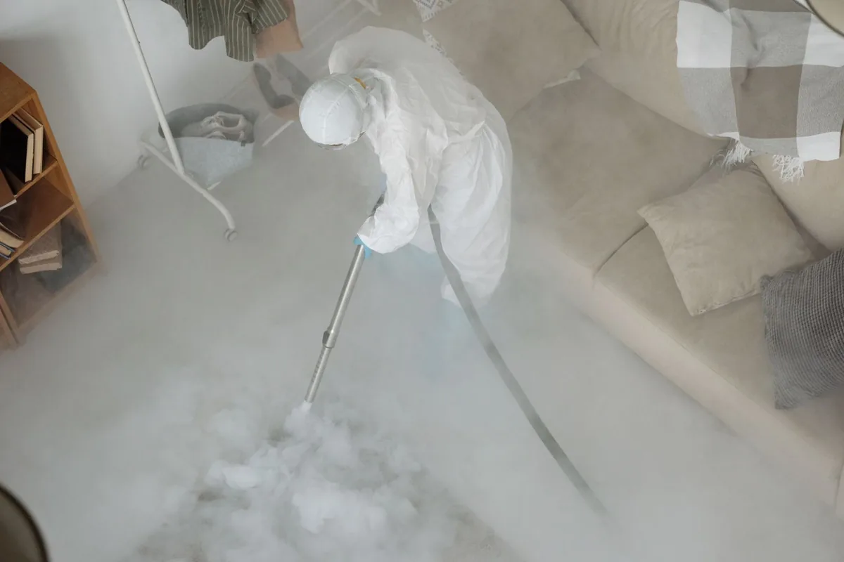 Biohazard cleanup technician in protective equipment, Dunean, SC